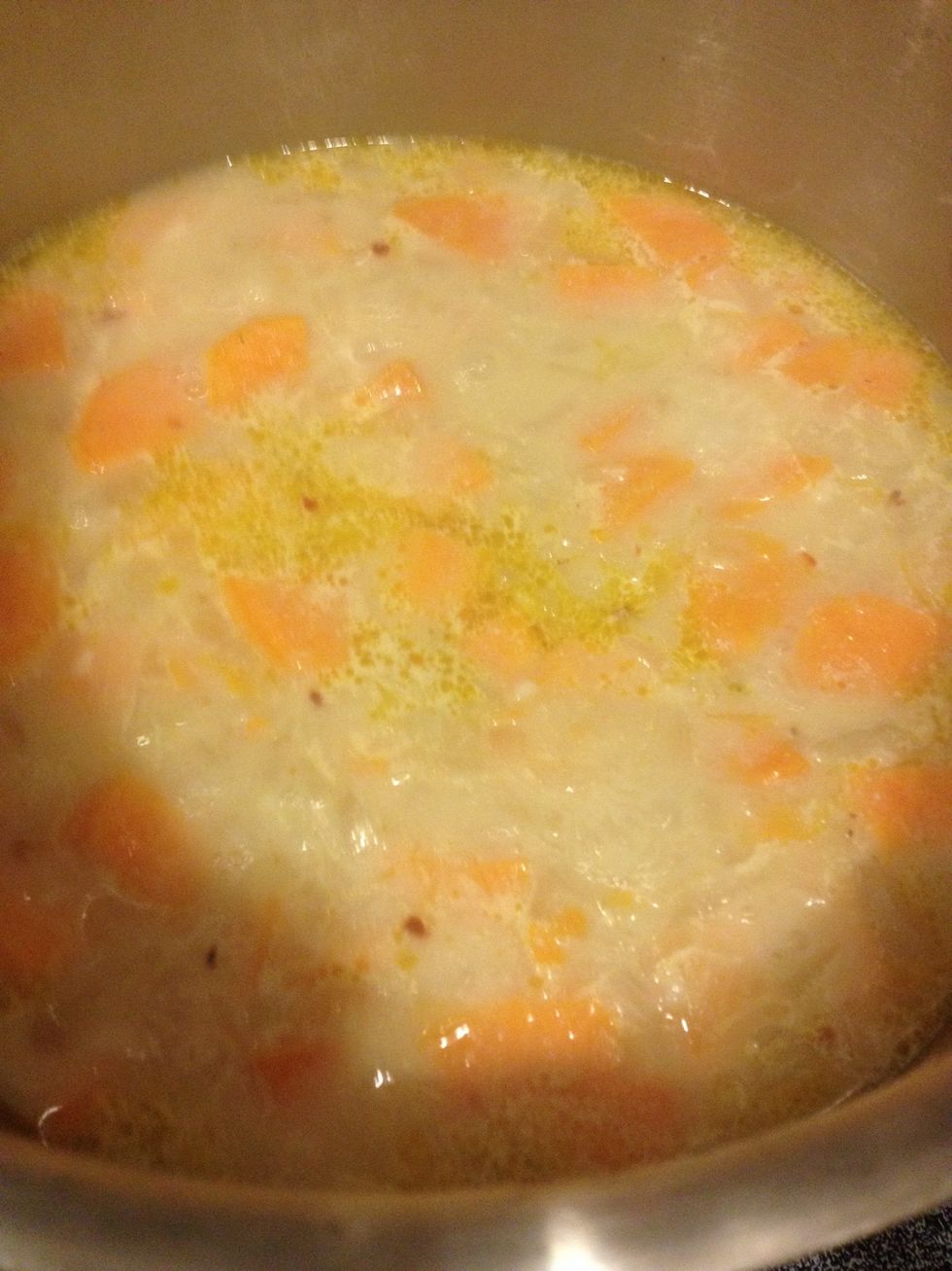 Bring to a rolling simmer. Cover and cook for about 30 minutes or until potatoes are soft.