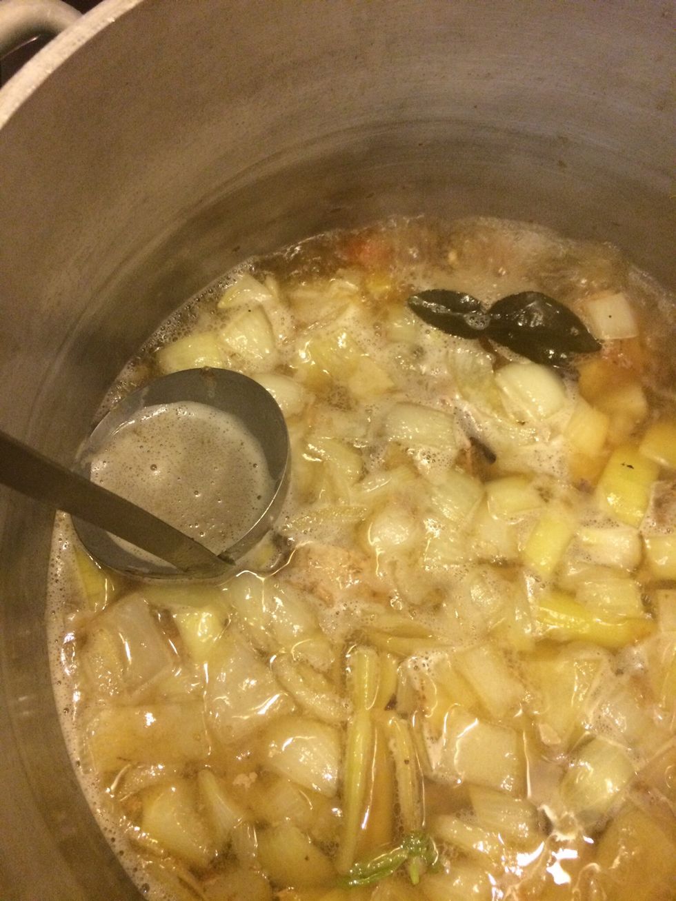 Bring to a simmer and skim