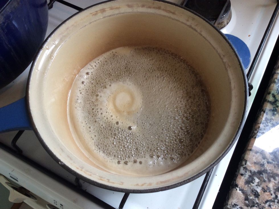 Bring to the boil, stir very occasionally.  But keep watching it.