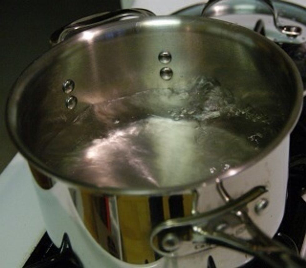 Bring two quarts of water to a rolling boil.