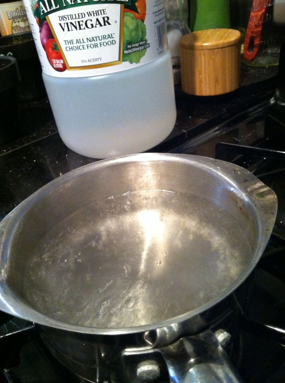 Bring water and vinegar to a simmer on med low heat. Do not boil