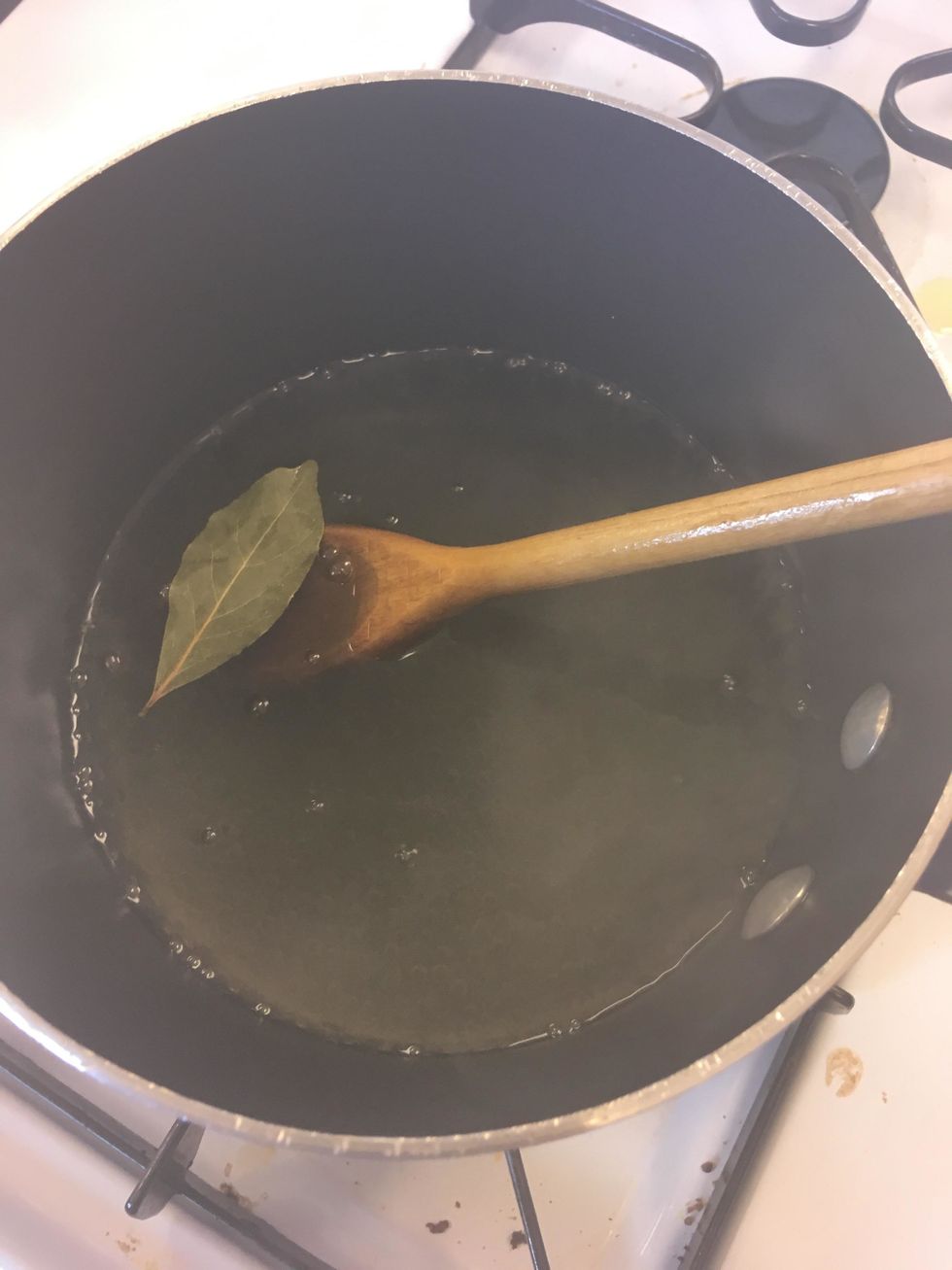 bring water, vegetable broth, bay leaf and salt to a boil