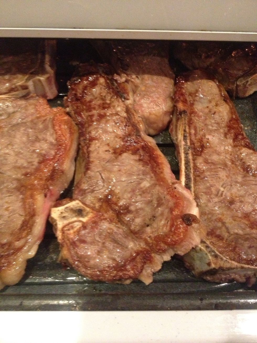 Broil steaks at 550\u2022 until cooked to desired temperature (I'm a medium kind of guy)