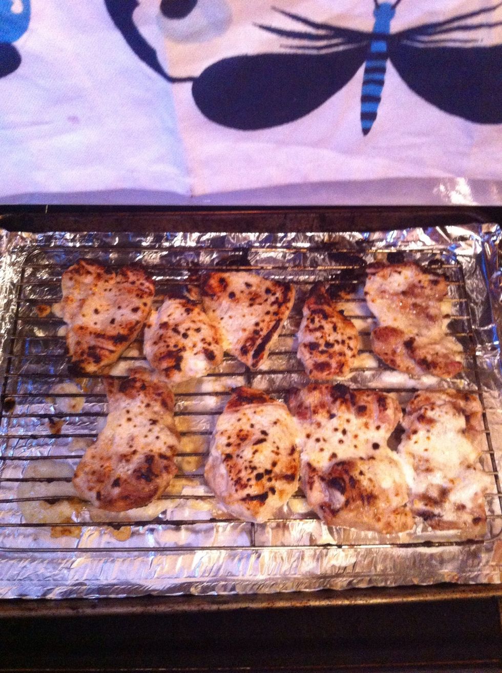 broil your chicken on both sides. depending on how thick it is for about 12-18 minutes. flipping half way through. it should get these glorious blackened spots on them. that's called flavor my friend!