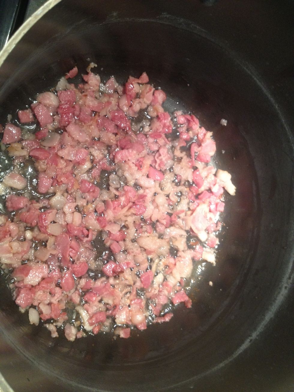 Brown bacon in a deep pot.