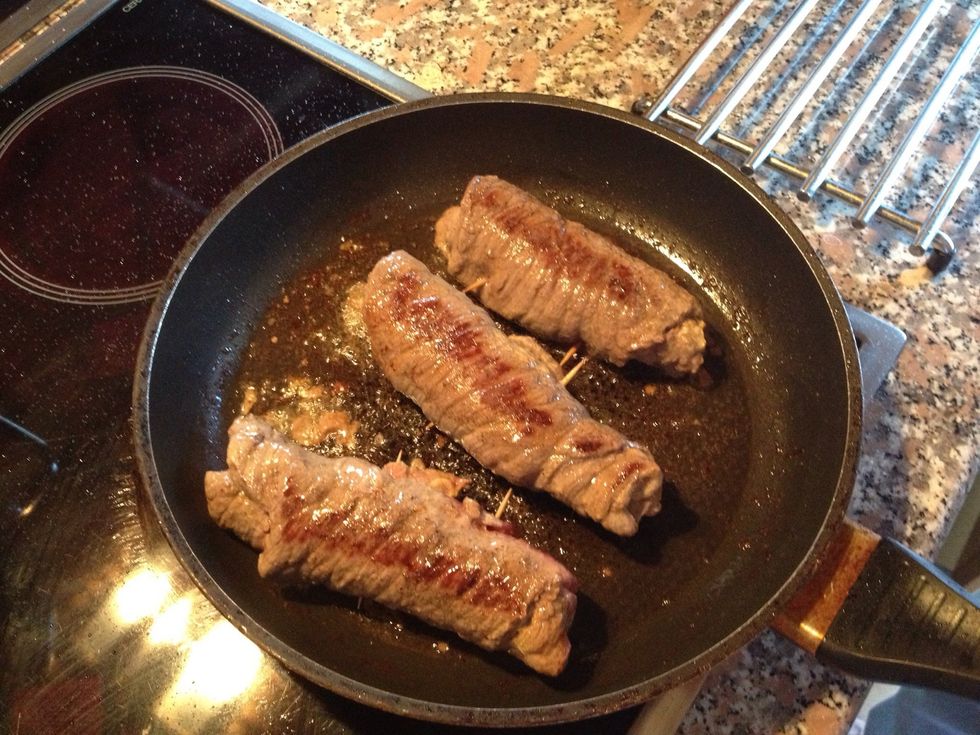 Brown bottom then flip to other side (you want medium heat)