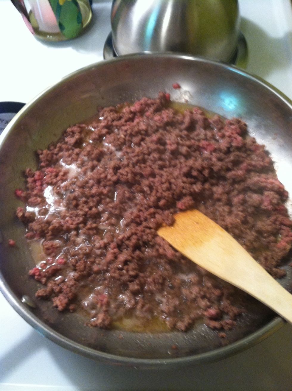 Brown ground beef in large skillet. Feel free to add any seasonings you like. I just added salt & pepper.