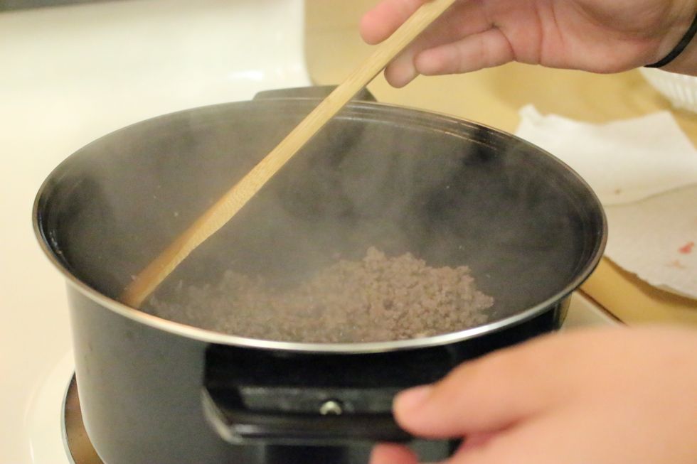 Brown ground meat until no pink remains.