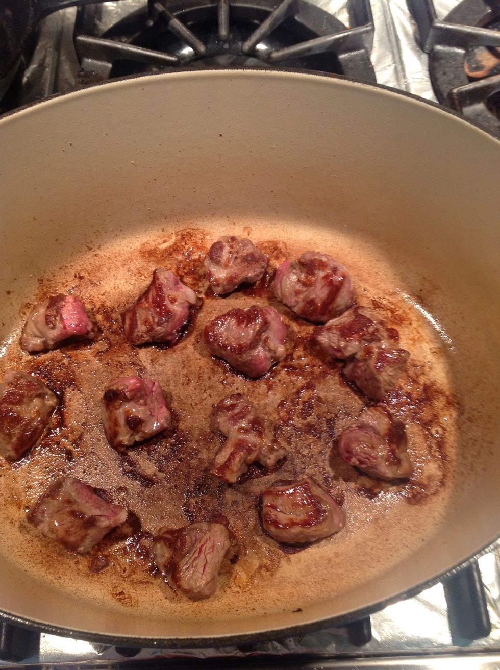 Brown lamb in casserole with olive oil in small batches.