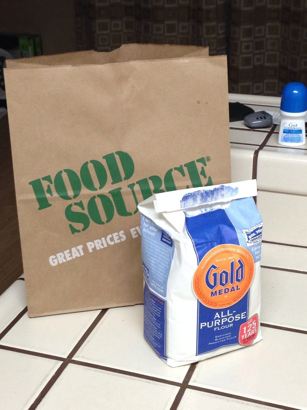 Brown paper bag is need to add the flour