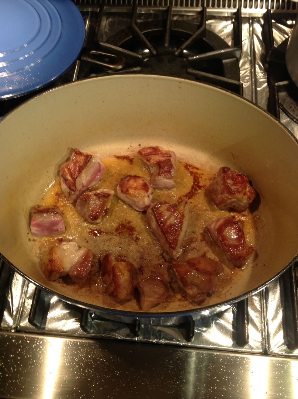 Brown pork cubes in small batches and set aside.