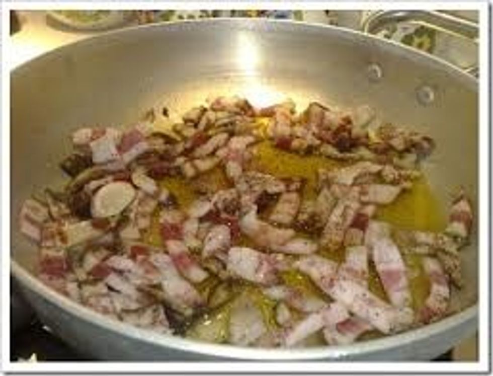 brown the bacon in the oil in a skillet over medium heat for a few minutes