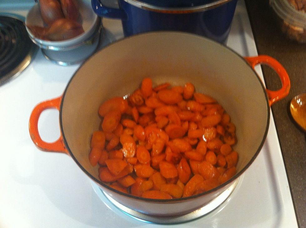 Brown the carrots in a little bit of butter over medium-high heat.