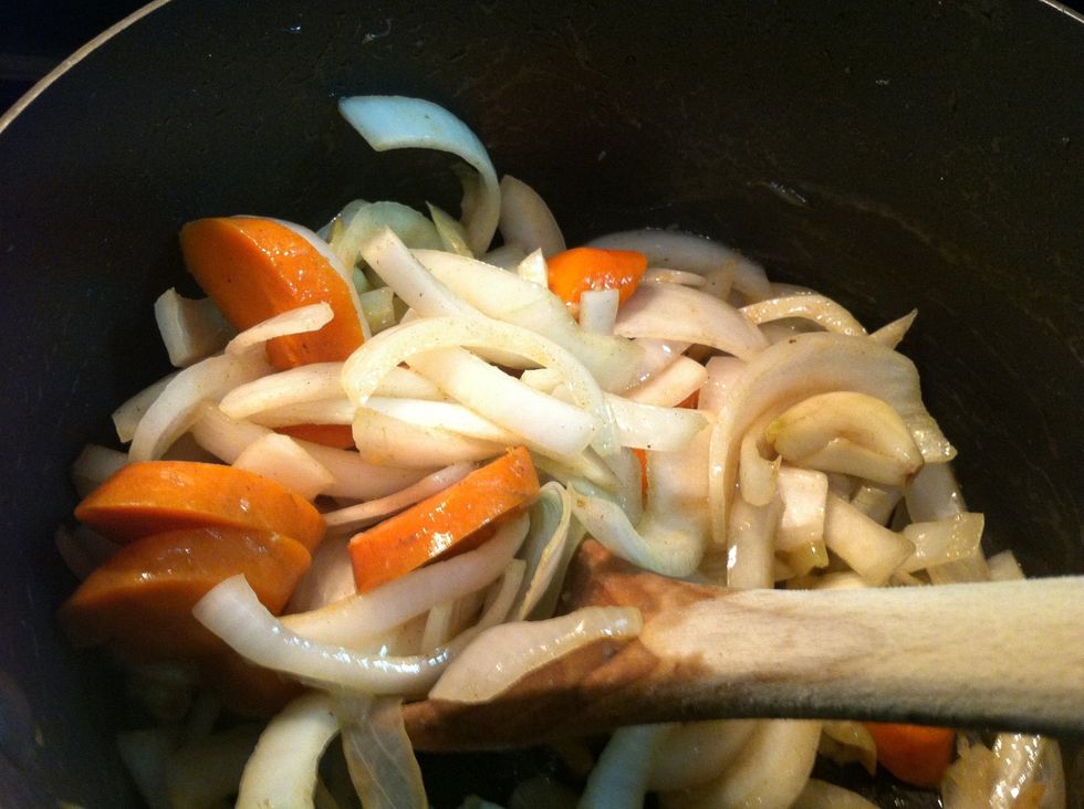 Brown the chopped onions, carrots and garlic in the reserved bacon/beef fat on medium heat until halfway cooked.