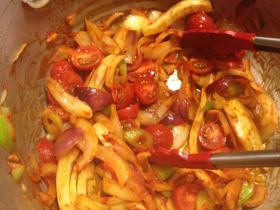 Brown the paste and add fresh tomatoes