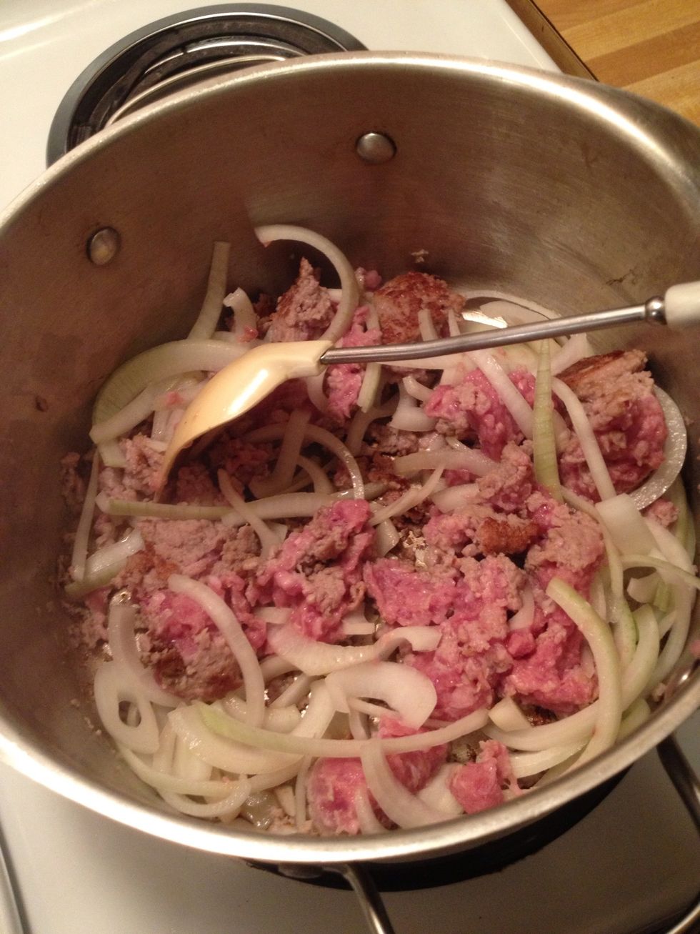 Brown the sausage over medium heat and break it up. Throw in the onions and cook those with the meat. *Note: you do NOT need to add oil if using Italian sausage - it will cook in its own fat.