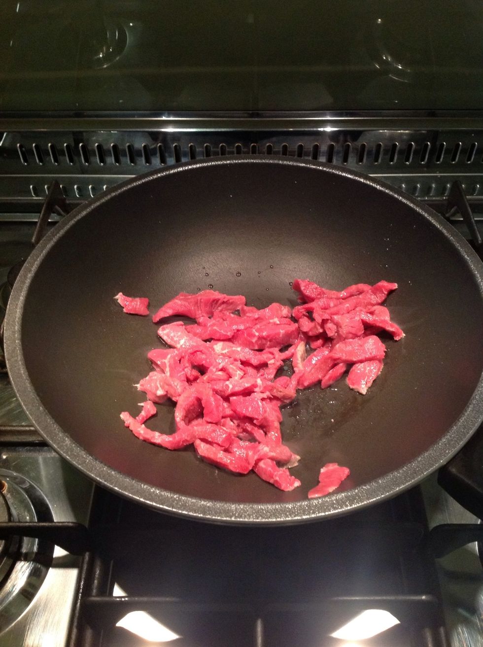 Brown up beef to seal in some oil in the wok