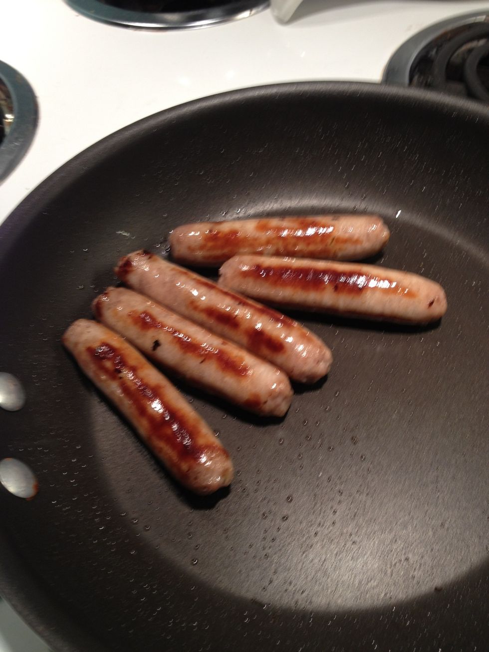 Brown up sausage. I prefer cut up sausage links, but any other form is fine. Any other meat is fine, it is whatever you want; ham,chicken, bacon, no meat.