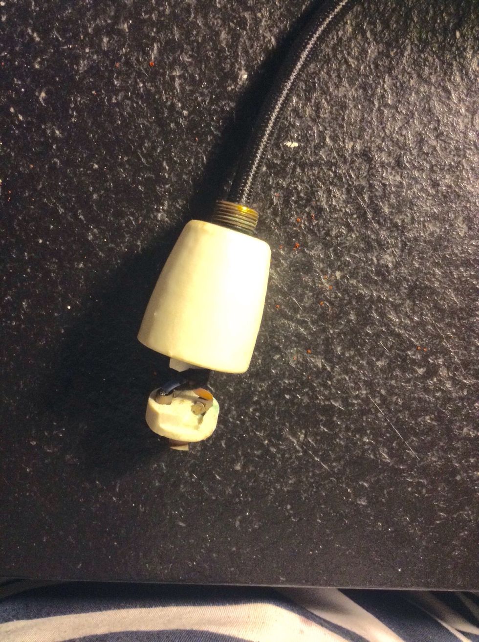 Brown wire in L1, blue wire in N. If there are no letters, just remember the brown wire should go in the terminal connected to the bottom piece of metal