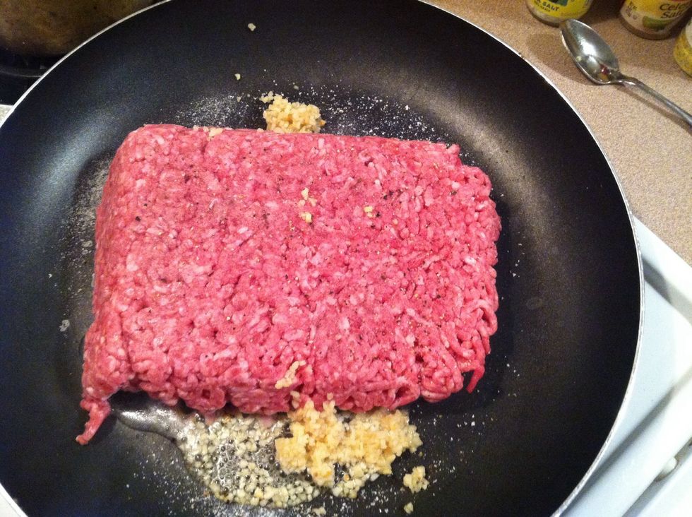 Brown your hamburger meat with your garlic. Add some salt and pepper to your liking.
