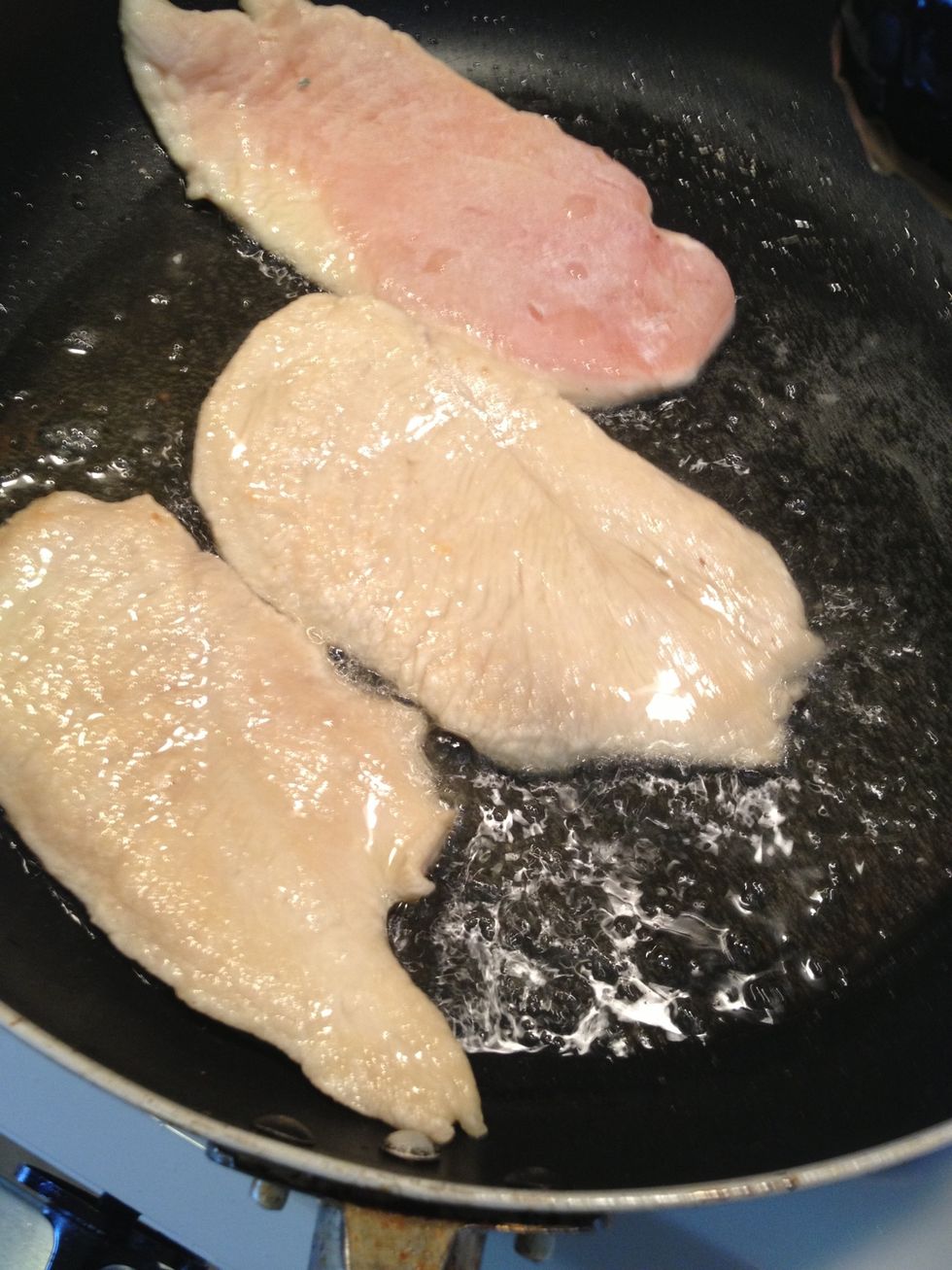 Browning and almost done. When all the chicken cutlets are cooked remove them