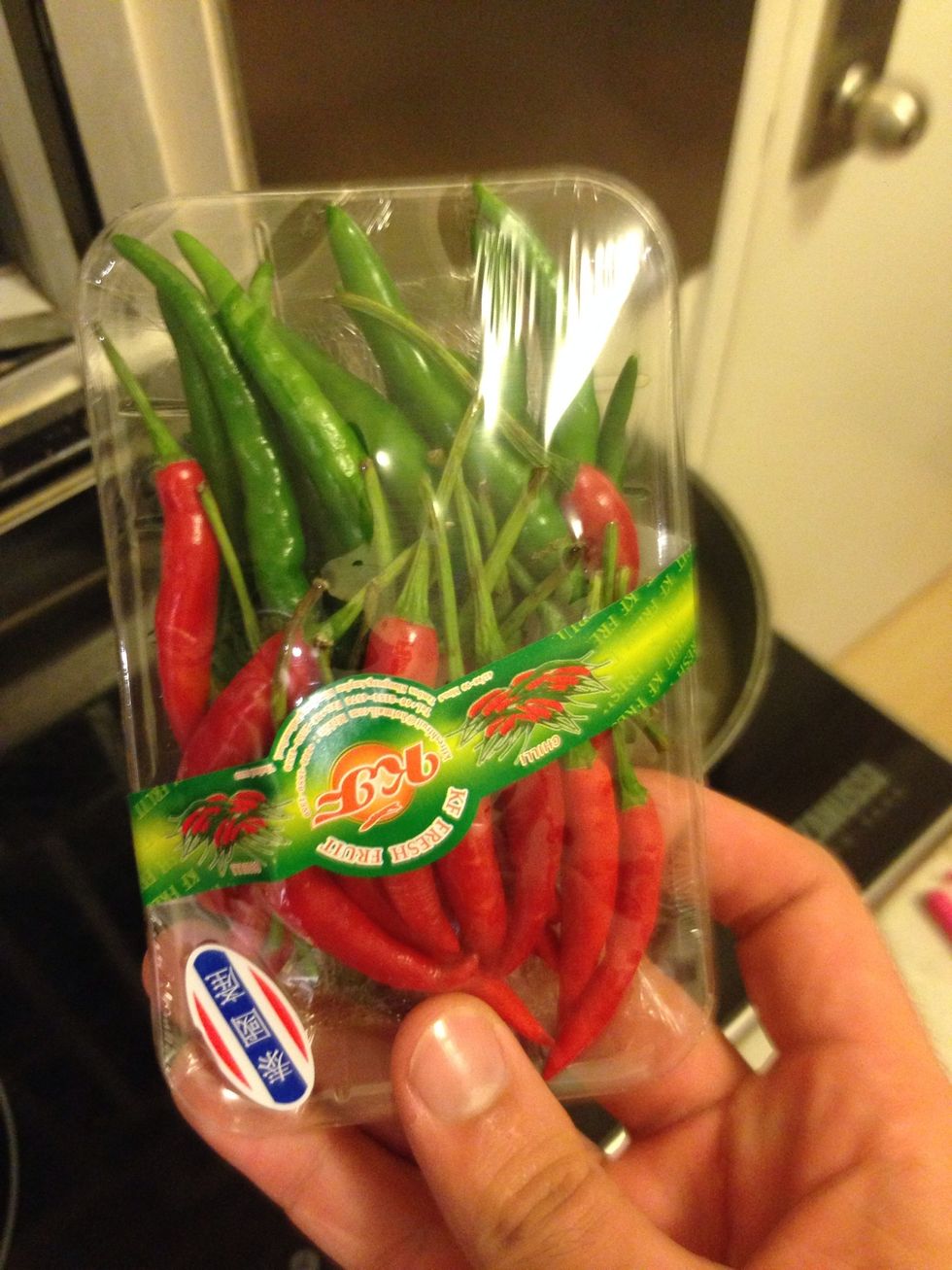 Bruise 4-8 bird's eye chillies depending on desired level of spice