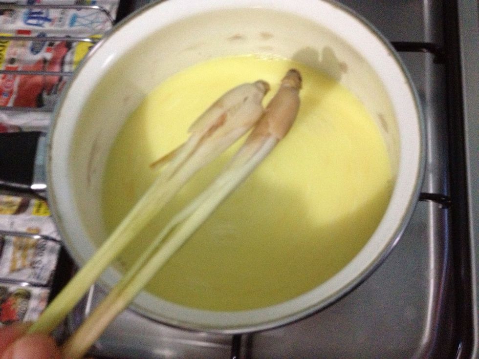 Bruised 2 lemongrass and add in to the coconut milk mixture