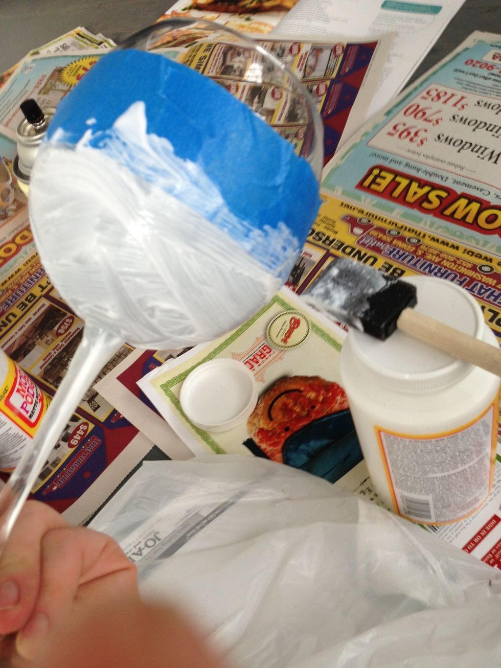 Brush a THIN layer of mod podge over the area you plan to glitter.