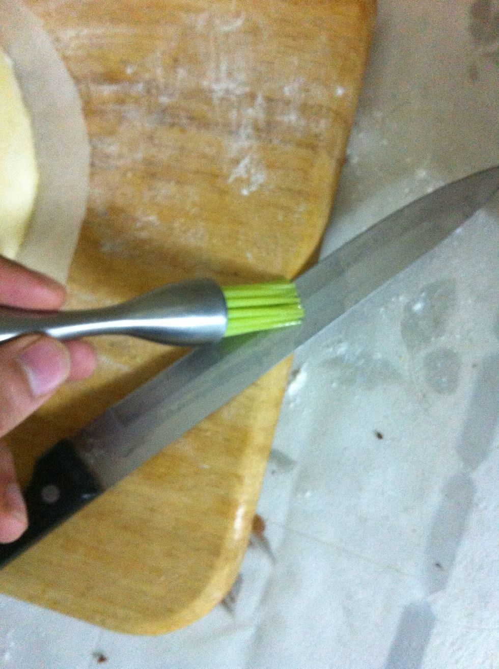 Brush along the edge of a VERY VERY sharp knife, or just use a disposable razor blade.