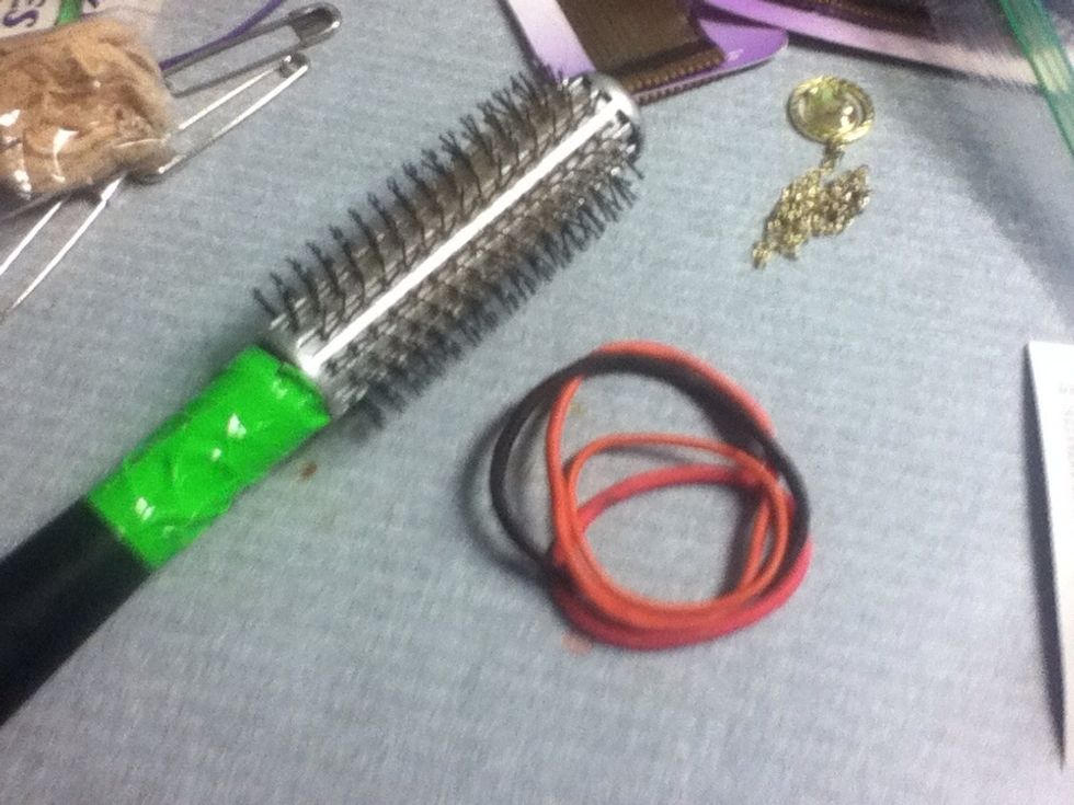 Brush and alot of hair ties.