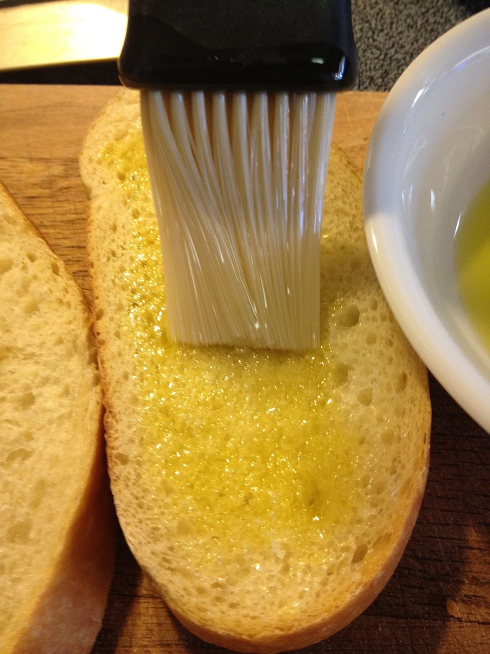 Brush both sides with olive oil.