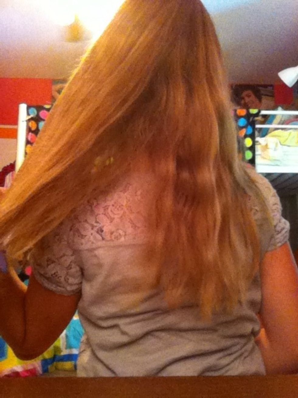 Brush/comb your hair, part it in the middle