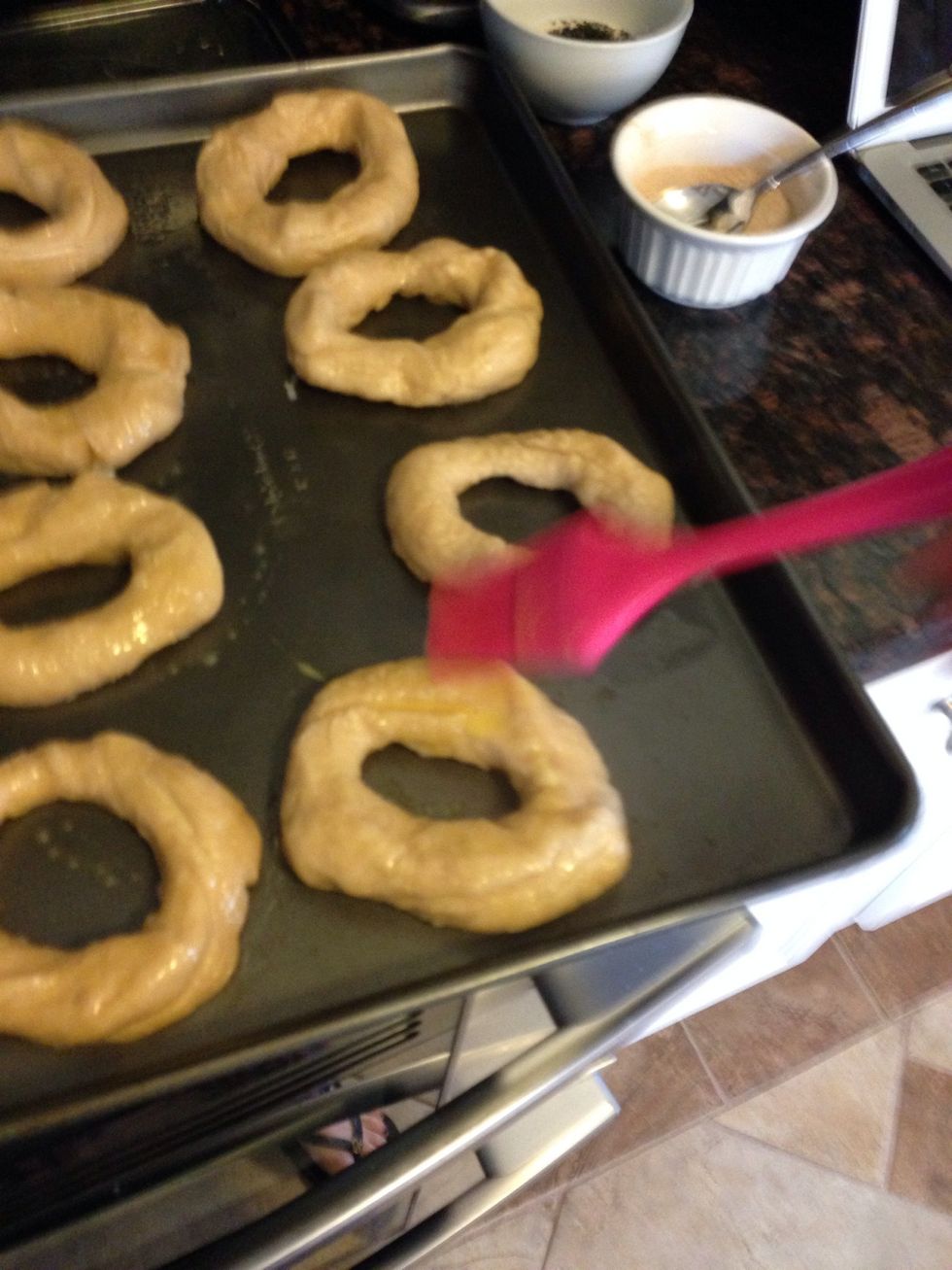Brush each bagel with egg wash.