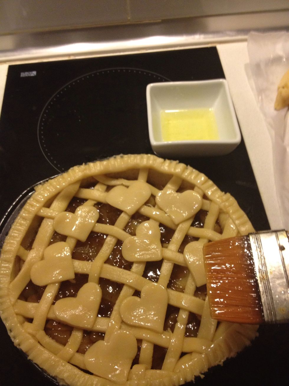 Brush egg whites all over the pie