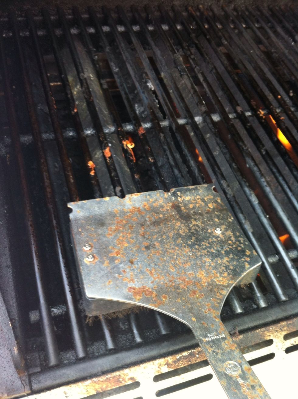 Brush off the big pieces left from cooking.