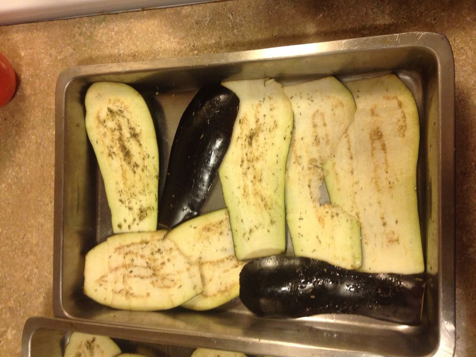 Brush oil mixture on each side of eggplant, bake about ten mins on each side