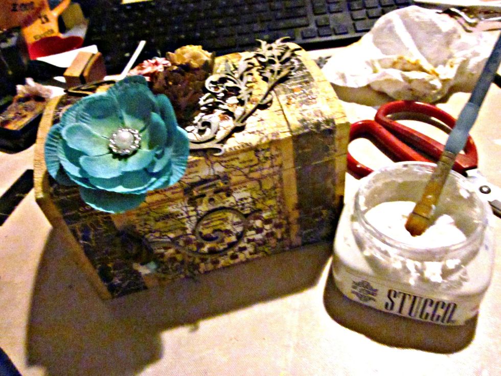 Brush on some Stucco Medium on the embellishments for added texture.