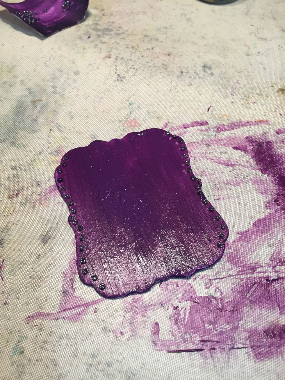 Brush on your paint as you normally would, then place your beads around the top and bottom. No need to glue them as you have glue already mixed in with your paint.