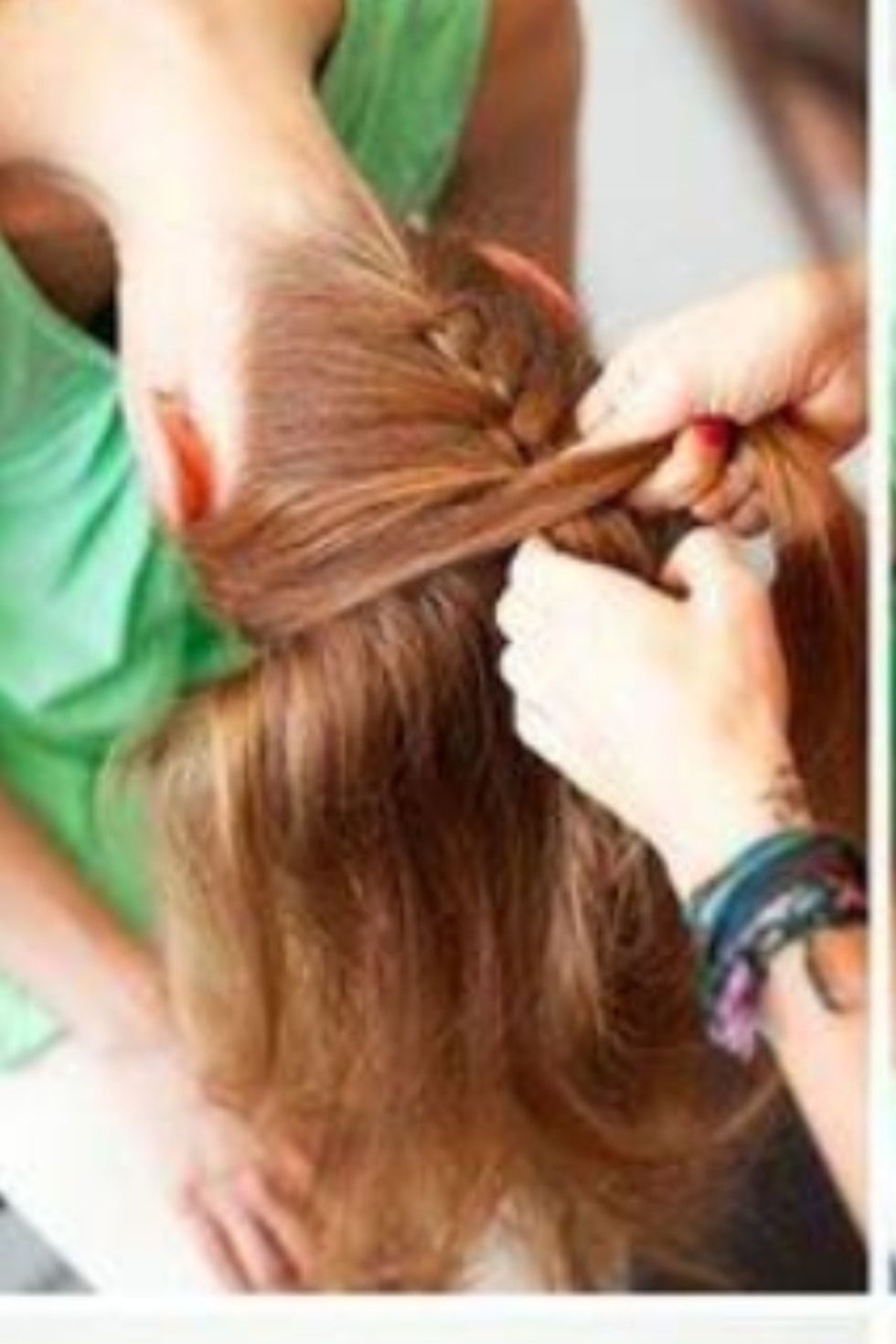 Brush out hair. Flip head over and start French braiding.