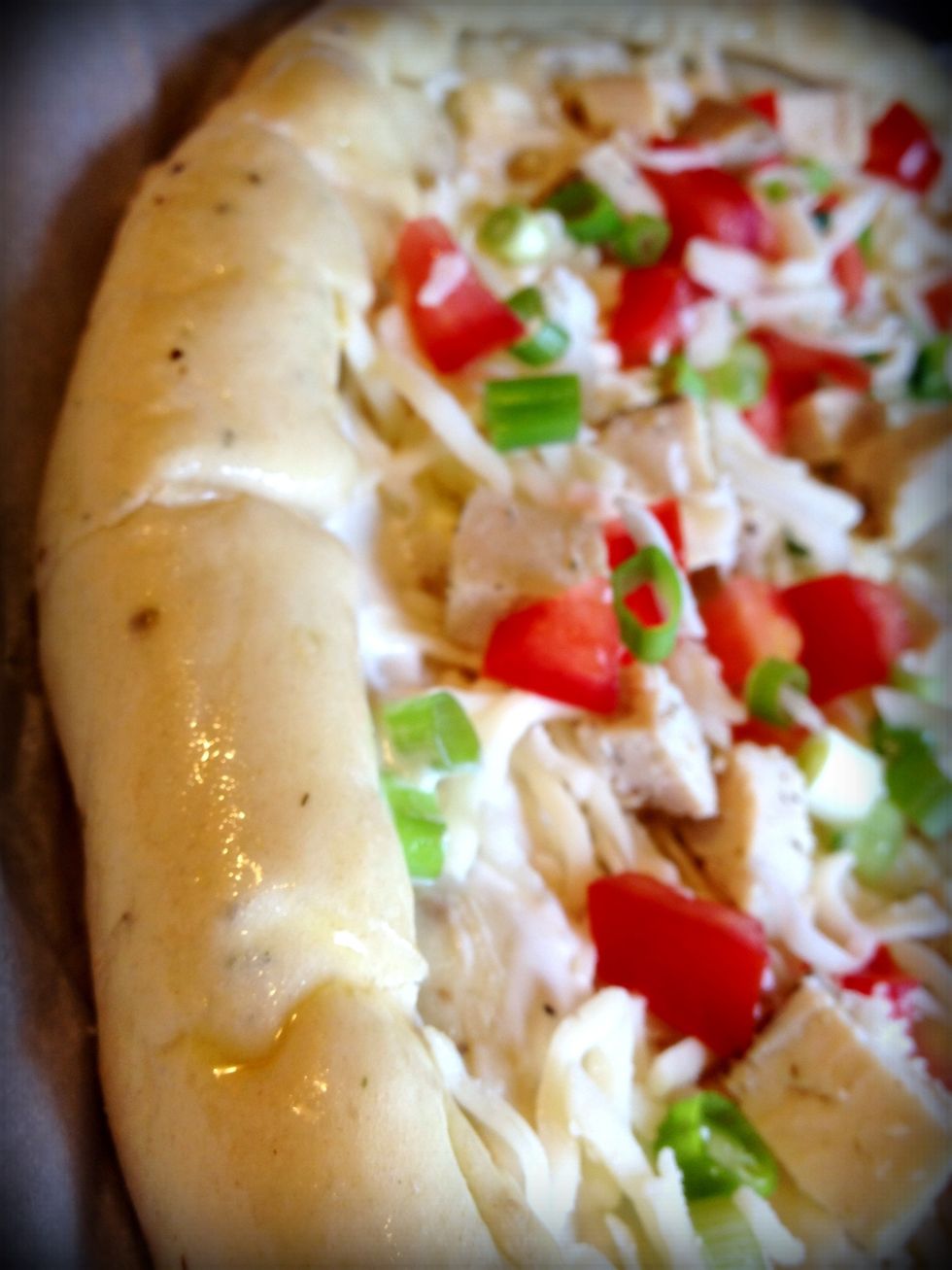 Brush outside of crust with olive oil.