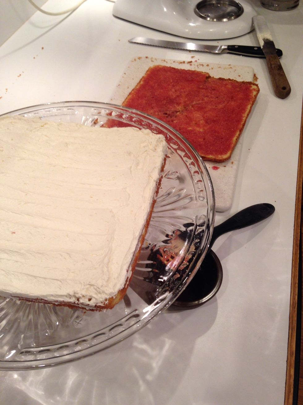 Brush syrup onto the top layer.