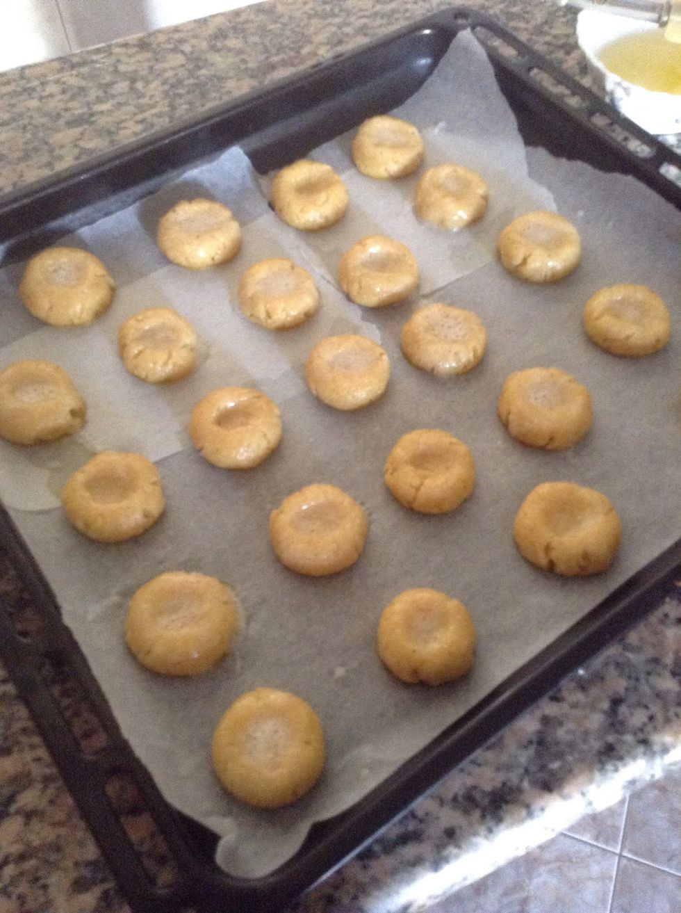 Brush the biscuits with egg white and place them into preheated oven 180* and bake for 10-15 minutes or until the toot pick comes out clean