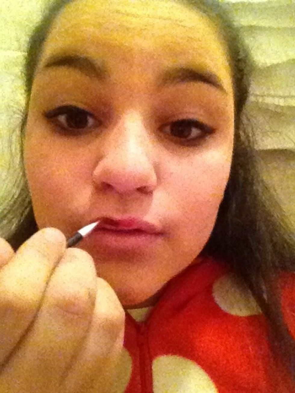 Brush the lipstick as if it were Liner then fill it in with the lipstick