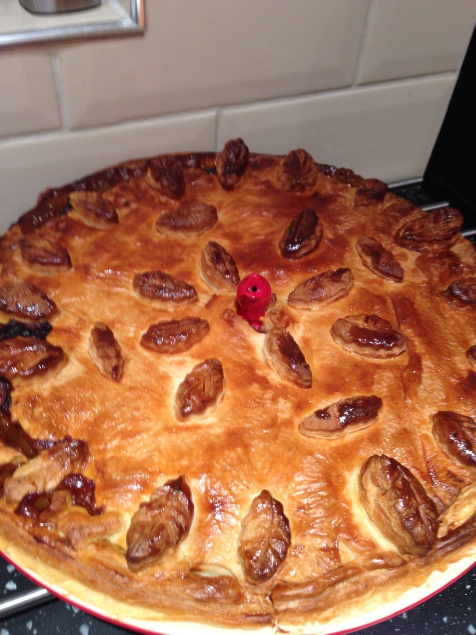 Brush the pie with beaten egg and cook in a pre heated oven 190\u00b0 for 45 minutes or until golden