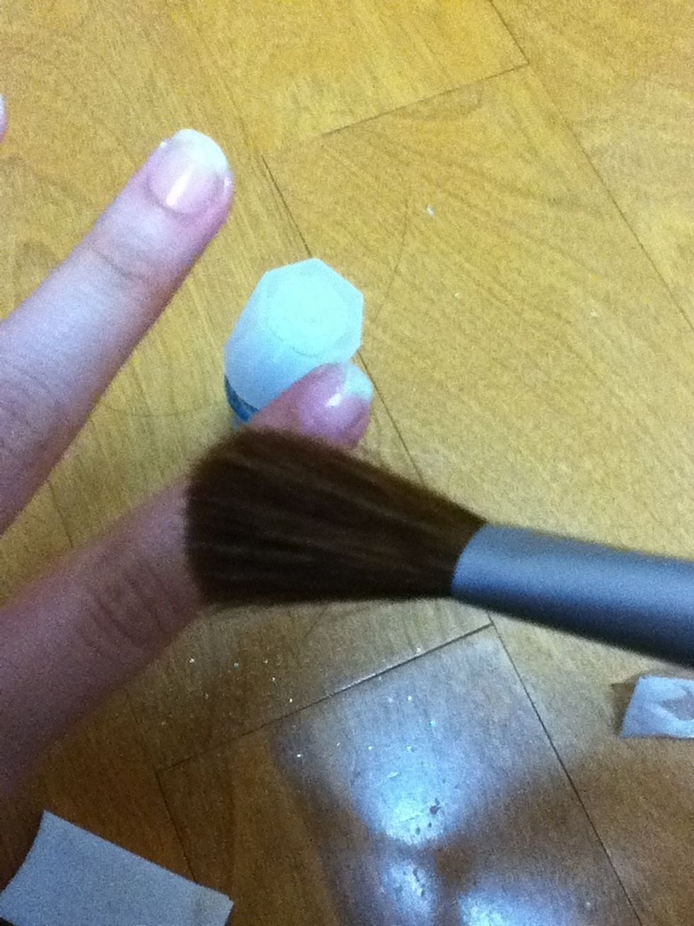 Brush the rest of the glitter off your finger
