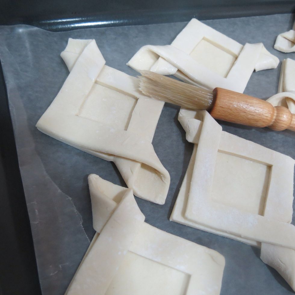 Brush the sides with milk or egg