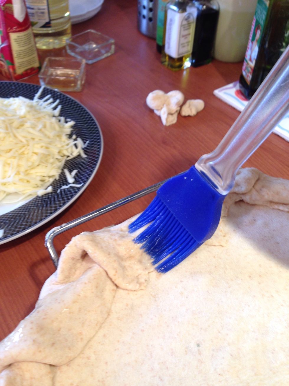 Brush the stuffed edge with olive oil