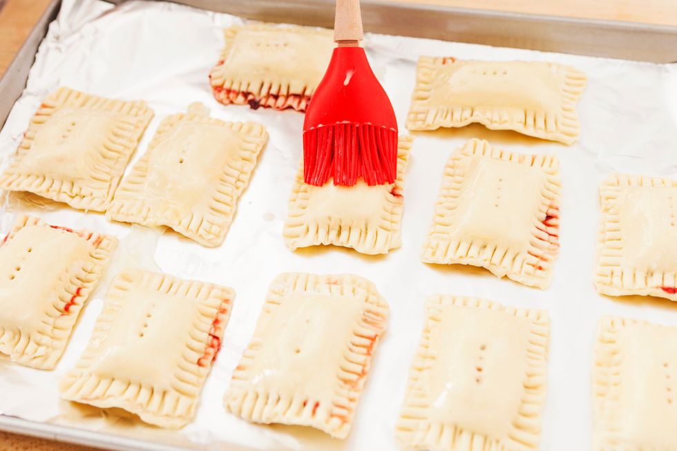 Brush the tops lightly with egg wash.