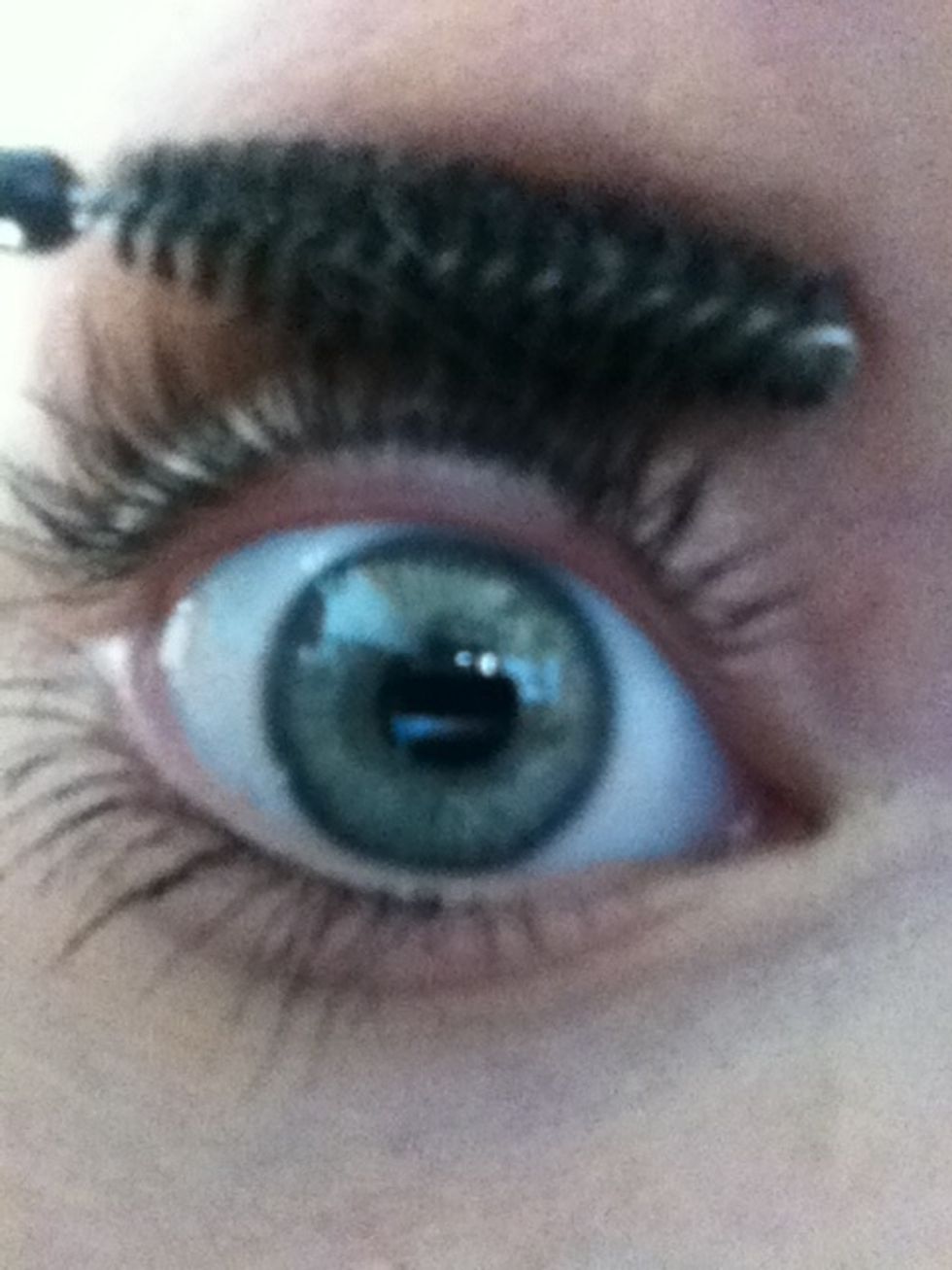 Brush through and separate lashes evenly.