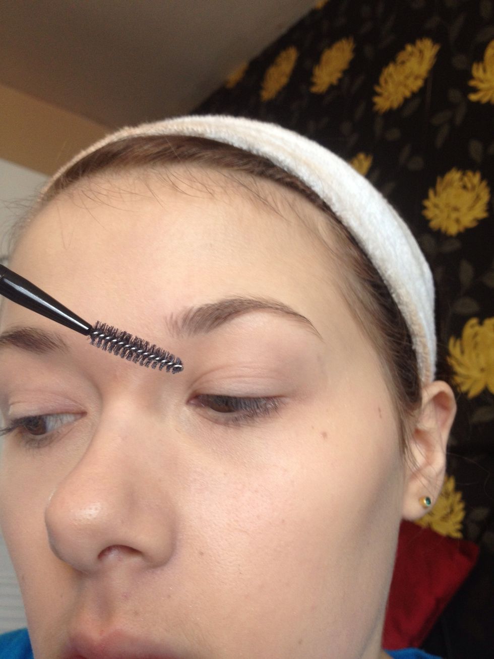 Brush through your brows into the shape you would like
